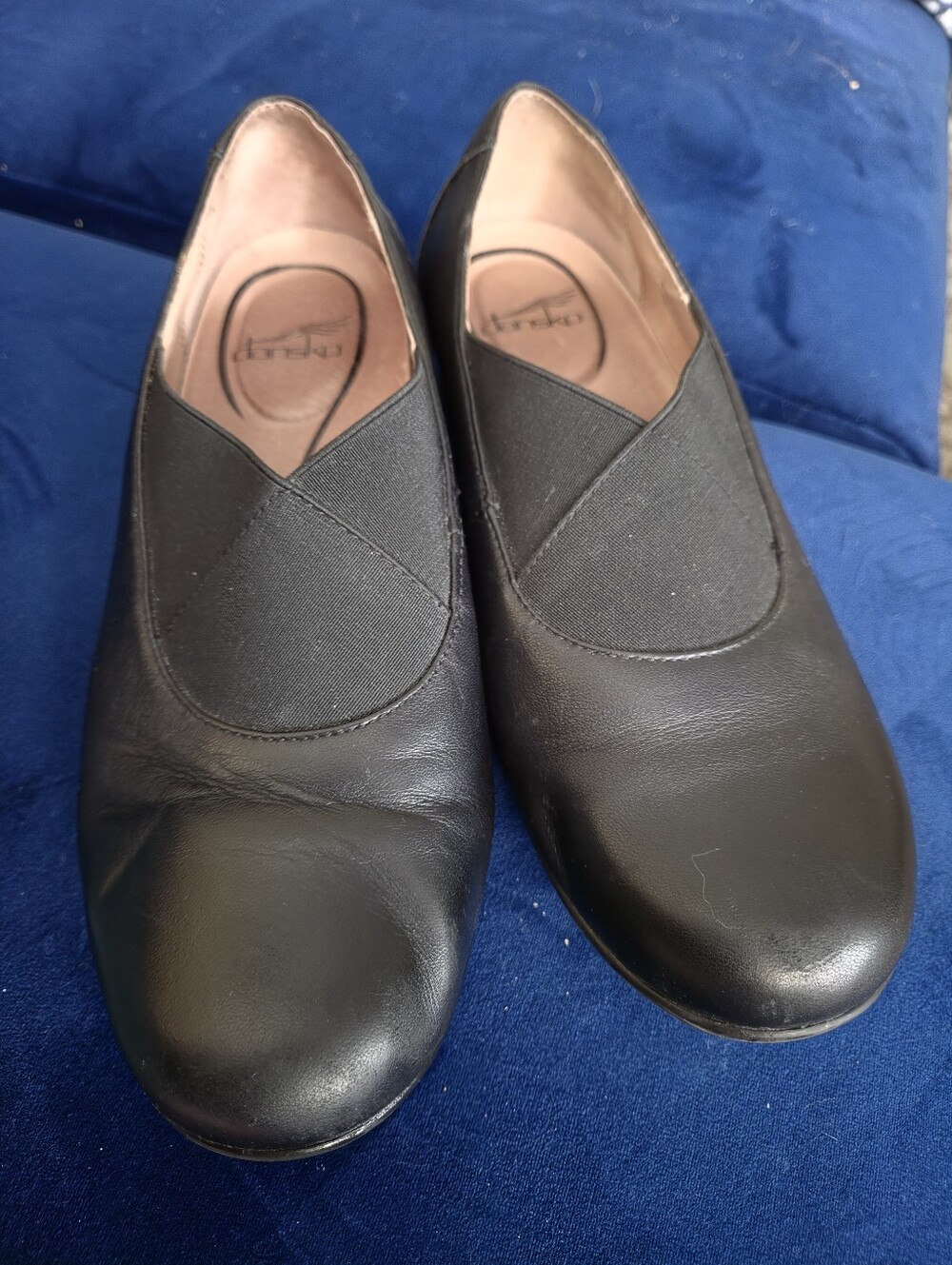 Dansko Black Leather Slip-On Women’s Flats